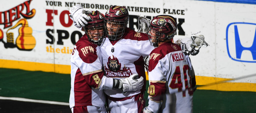 oshawa firewolves players celebrating a goal