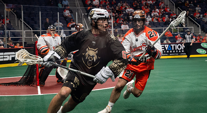 box lacrosse players in action